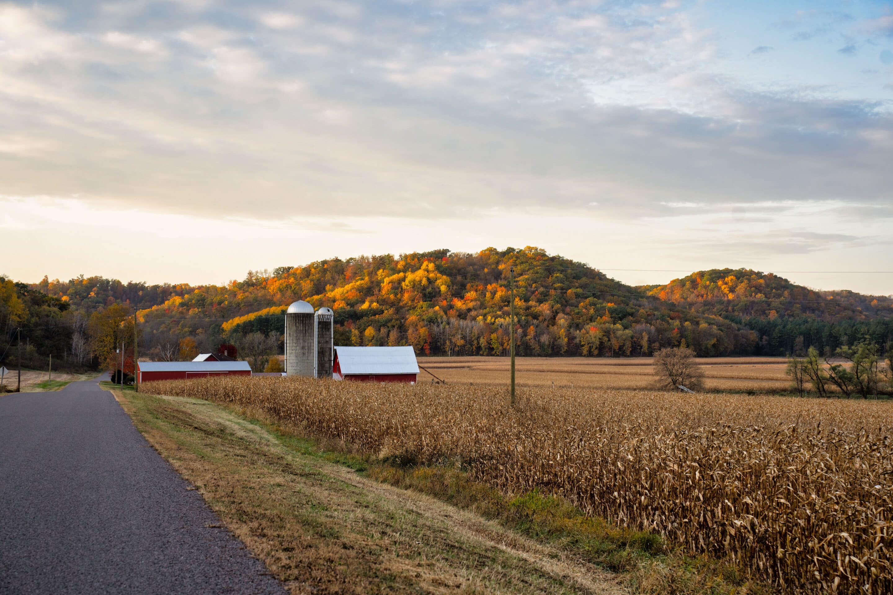 A horse property with pasture, barn in autumn